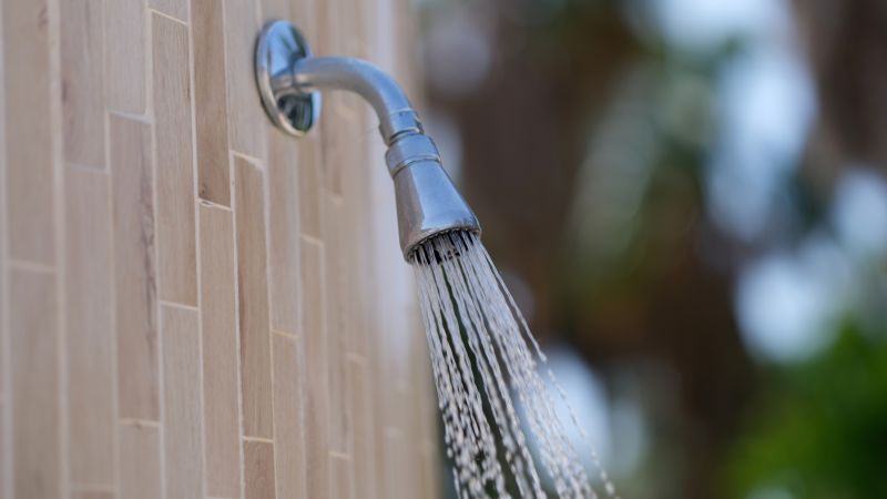 Image of a sunny outdoor shower area